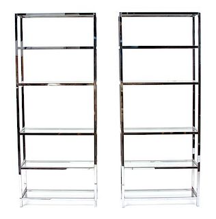 A Pair of Chromed Metal Book Cases Height 79 x width 32 x depth 12 inches.