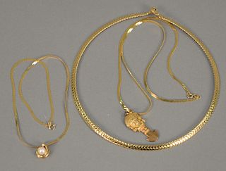 Three 14 karat gold necklaces. 21.4 grams