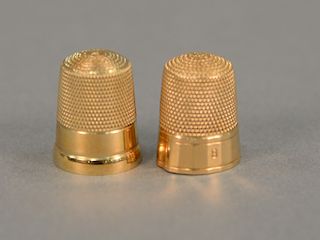 Two 14 karat gold thimbles, 6.9 grams.