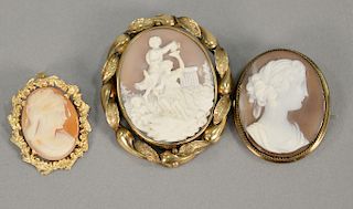 Three cameos including revolving cameo and two others. ht. 2 1/2 in., 2 in., & 1 1/2 in.