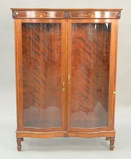Mahogany Victorian inlaid curio cabinet with two bowed glass doors. ht. 66 in., wd. 48 in.