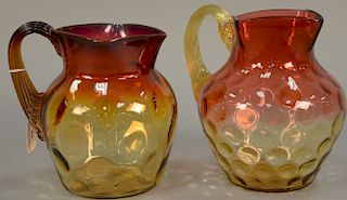Two amberina glass pitchers. ht. 7 in. & 7 1/2 in.