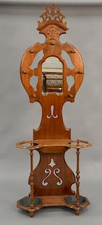 Walnut Victorian coat rack with mirror. ht. 89 in., wd. 32 in.
