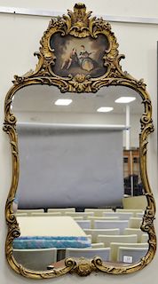 French style gold framed two part mirror with oil on canvas in top section of Romantic scene, signed de Saldo. 50" x 28"