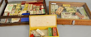 Two display cases with vintage lures with original boxes. ht. 3 in., wd. 19 in. and ht. 6 in., wd. 21 in.