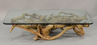 Mid-century root driftwood glass top table. ht. 14 1/2 in., top: 30" x 54"