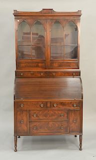 Custom mahogany cylinder roll top secretary desk with tambor style cylinder. ht. 79 in., wd. 39 in.