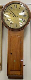 Mahogany regulator clock with brass dial. ht. 55 in.