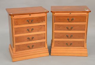 Pair of diminutive four drawer stands with pull out slide. ht. 28 in., wd. 22 in.