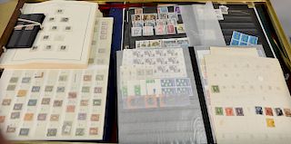 Group of stamps and stamp albums.