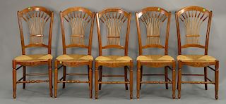 Set of five French style rush seat chairs.