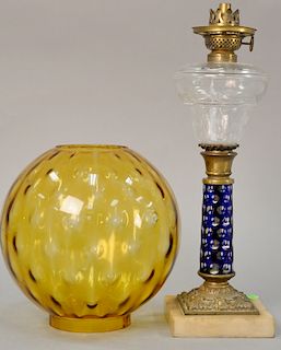 Victorian oil lamp having cobalt blue cut to clear stem along with non matching shade. ht. 15 1/2 in.