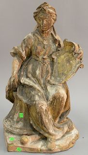 Earthenware classical figure of a seated woman with shield. ht. 24 in., wd. 14 in.