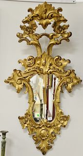 Gilt decorated continental mirror. 51" x 27"
