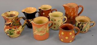 Eight French pottery pitchers, Jaspe pitchers classic marble glaze, etc. ht. 4 in. to 7 in.