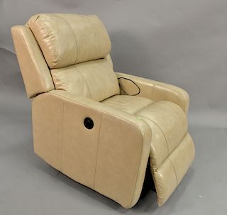 Light tan leather electric reclining chair.