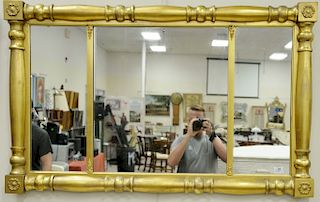 Federal style three part gilt over mantle mirror. 31" x 51"
