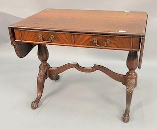 Mahogany drop leaf library table with two drawers. ht. 28 in., top: 25" x 36"