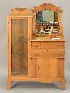 Victorian oak cabinet with leaded glass and mirror. ht. 70 in., wd. 47 in.