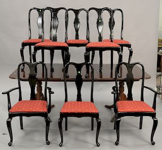 Nine piece lot to include mahogany double pedestal dining table with three 10 1/2 inch leaves and set of eight black lacquered chair...