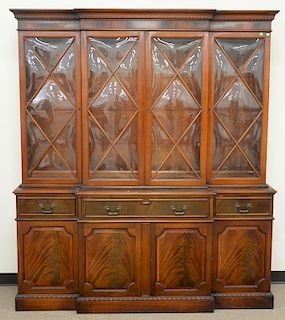 Masons mahogany two part breakfront with bubble glass. ht. 83 in., wd. 71 in.