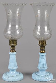 Pair of starch blue candlesticks, 19th c., with cut and etched shades, 19 1/4'' h.