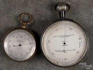 Pocket barometer by Keuffel & Esser, N.Y., 2 3/4'' dia., together with an English example, 2'' dia.