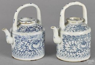 Two Chinese blue and white porcelain teapots, 19th c., 5 1/2'' h. and 5 3/4'' h.