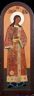 Large Russian Icon, 20th c., of a female Saint holding a box, gilt and egg tempera on arched panel, H.- 63 in., W.- 23 in., D.- 1 in.