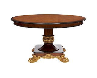 Continental Mahogany and Burlwood Inlaid Parcel Gilt Paw Foot Pedestal Center Table, 19th century