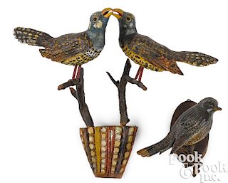 Two painted bird carvings