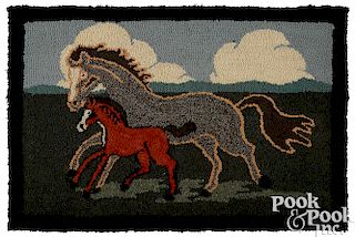 Pennsylvania hooked rug of a horse and foal