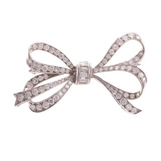 A Lady's White Gold Diamond Bow Pin
