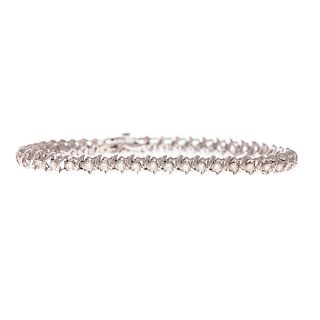 A Lady's Diamond Straight Line Bracelet in 14K