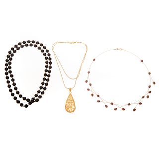 A Trio of Lady's Necklaces with Gold