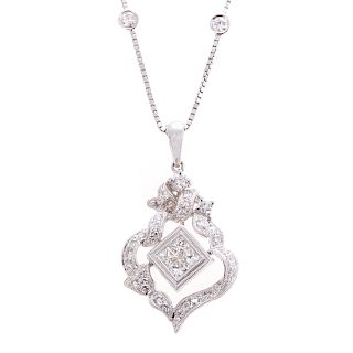 A Lady's Diamond Filigree Pendant in White Gold