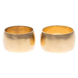 A Pair of Wide Gold Wedding Bands