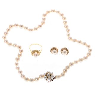 A Pearl Necklace, Earrings & Ring in Gold