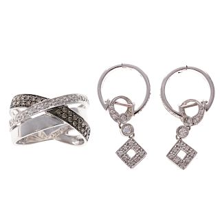 A Lady's Diamond Ring and Dangle Earrings in Gold