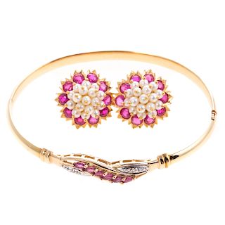 A Lady's Ruby Earrings & Bangle Bracelet in Gold