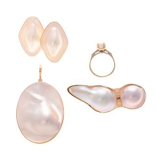 A Collection of Mabe Pearl Jewelry in Gold