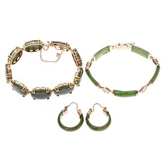 A Pair of Jade Bracelets and Earrings in Gold