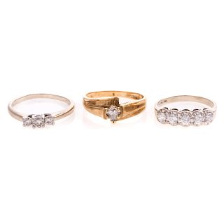 A Trio of Lady's Diamond Rings in Gold