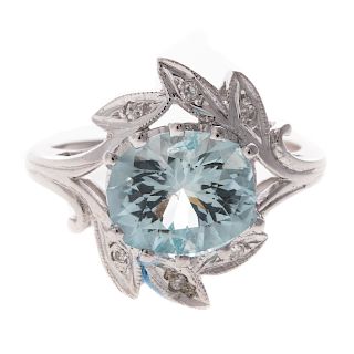 A Lady's Aquamarine & Diamond Ring in 14K
