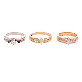 A Trio of Diamond Engagement Rings & Bands