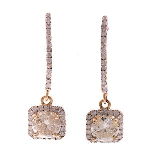 A Pair of Yellow & White Diamond Earrings in Gold