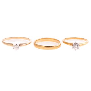 A Pair of Diamond Solitaire Rings & Band