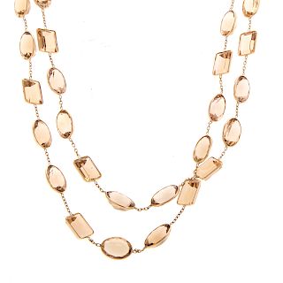 A Lady's Long Smoky Quartz Necklace in 14K Gold