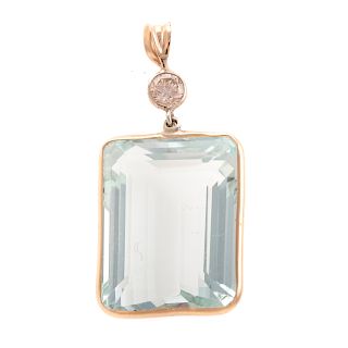 A Lady's Aquamarine & Diamond Pendant in 14K