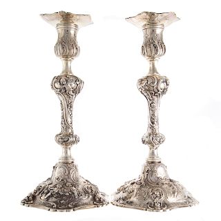 Pair of Rococo style sterling candlesticks
